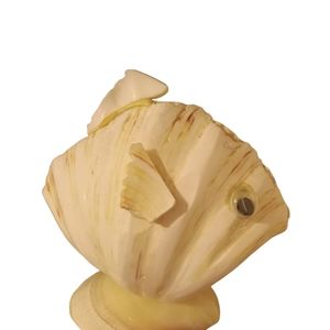 Fish made from shells. 3x5. Really cool piece. In good condition.